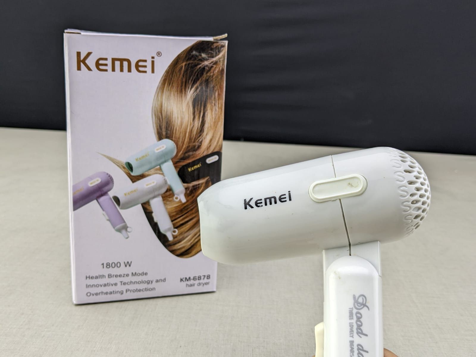 Kemei Mini Portable and Foldable Hair Dryer